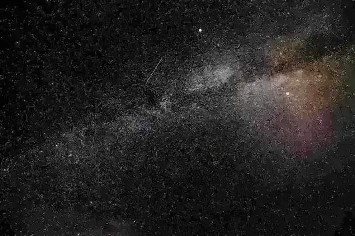 A night sky with stars and the milky